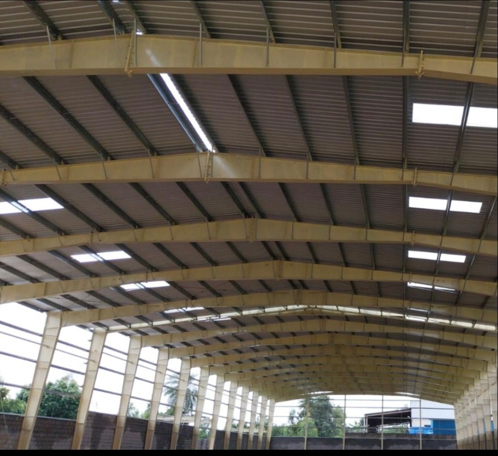 Completed industrial PEB steel shed interior by MM Engineering Works