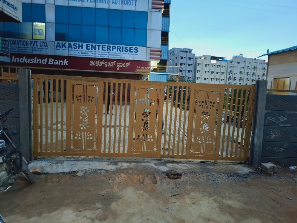 CNC Laser-Cut Yellow Entrance Gate for Commercial Building
