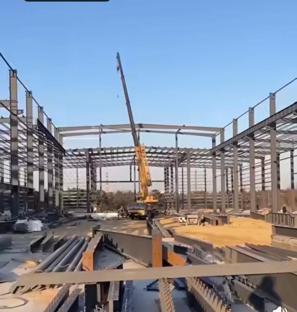 PEB Warehouse Erection Site Construction with Crane