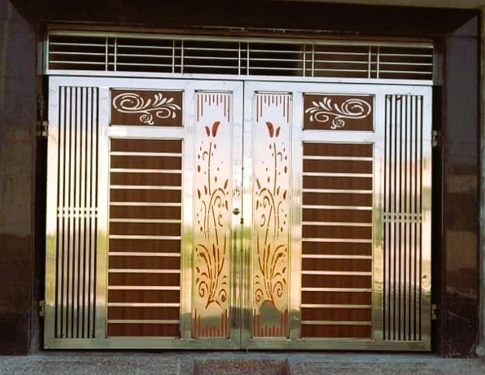 Premium double-leaf sliding compound gate made of stainless steel frame with wood panels and laser-cut floral details